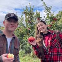 Sage Students holding apples